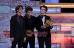 The Jonas Brothers at 66th Annual Golden Globe Awards on 13th Jan 2009 (36).jpg