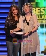 Singer Miley Cyrus, Taylor Swift  onstage at the 51st Annual GRAMMY Awards held at the Staples Center on February 8, 2009 in Los Angeles, California.jpg