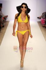 A model walks the runway at the Jogo Beach show during Merecedes-Benz Fashion Week Swim 2012 on July 18, 2011 in Miami Beach, United States (1).JPG