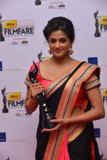 Priyamani received Best Actress Award for Charulatha (Kannada).jpg