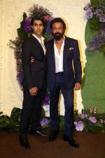 Bobby Deol with son Aryaman Pose for media at the reception of Karan Deol and Drisha Acharya on 18 Jun 2023 (27)_64906777e115e.jpeg